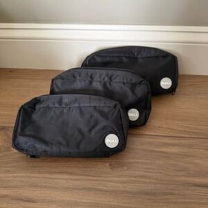 3 black Dell travel bags